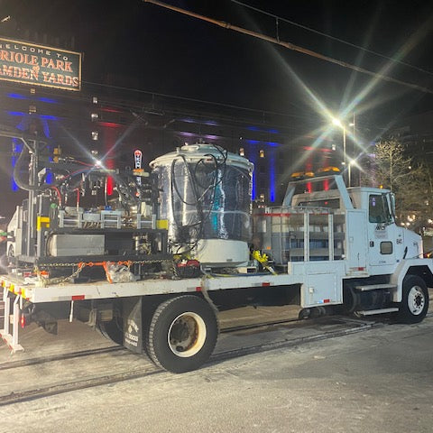 WVCO FastPatch rail encapsulation rig mounted on flatbed truck at railway work site